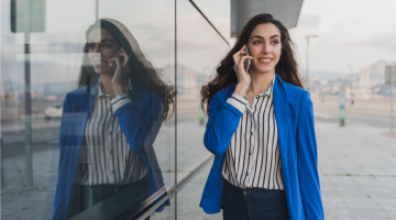 Woman smiling and talking on phone